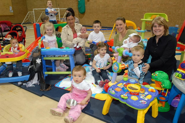 Parents and toddlers from Lukes Lane Community Centre with new play equipment in 2008. Can you spot someone you know?