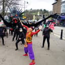 A giant oil monster and oil barons perform an oil-themed Jabberwocky in Matlock  as part of a National Day of Divestment against council pension funds being invested in fossil fuels.