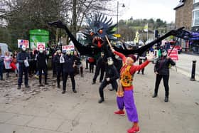 A giant oil monster and oil barons perform an oil-themed Jabberwocky in Matlock  as part of a National Day of Divestment against council pension funds being invested in fossil fuels.