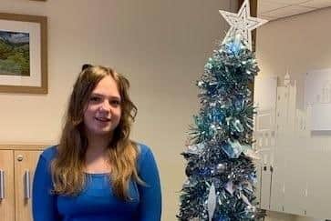 Mya Richards won the fake fiver Christmas tree competition run by Start Financial Planning.