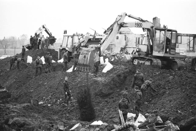 RAF servicemen search through the crater in the Borders town of Lockerbie, where Pan Am flight 103, a 747 Jumbo jet, crashed after a bomb exploded on board in December 1988.
