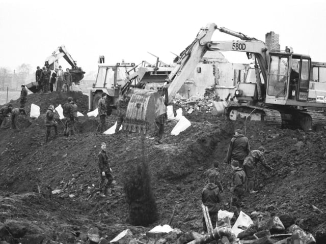 RAF servicemen search through the crater in the Borders town of Lockerbie, where Pan Am flight 103, a 747 Jumbo jet, crashed after a bomb exploded on board in December 1988.