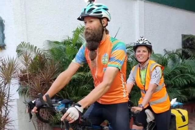 The married couple are on course to become the fastest cyclists to travel 18,000 miles around the world on a tandem bike in 180 days.