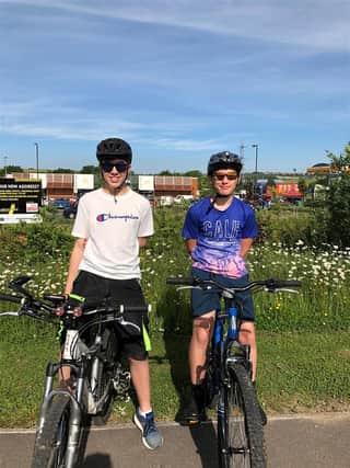 Friends Dylan Thomas and Jayden Beniston are to take on a 50-mile charity bike ride on July 3