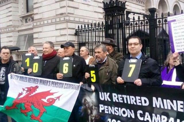Former mineworkers campaigning outside Downing Street for a fairer pensions deal