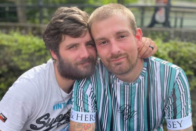 Ashley, left, and Arran Gouge say they have faced homophobic abuse when confronting neighbours intruding into their garden.