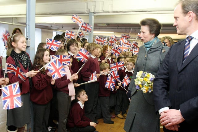 Children of Lea Primary School give a warm welcome to Princess Anne on her visit to John Smedley Knitwear in Lea Bridge in 2009.