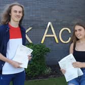 Ben Madeley (left) and Angel Robinson pick up the school’s best GCSE results this year.