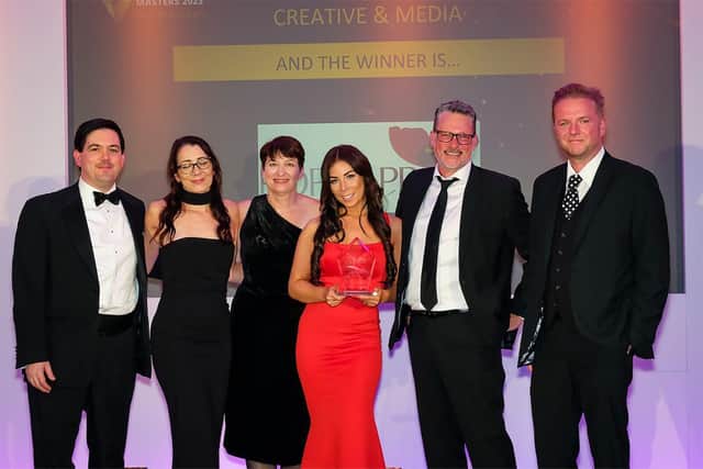 The Poppy PR team pick up their award for best creative &amp; media firm in the East Midlands