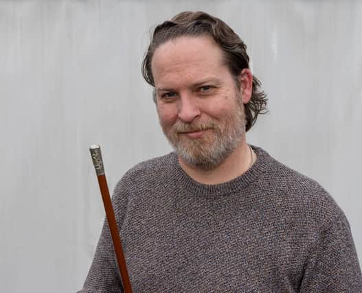 Matt Crowson, Hansons head of militaria, with the Zillessen swagger stick (photo: Mark Laban/Hansons)