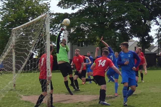 Action from Hasland Club (red) v Britannia in the Hutson Cup semi-final.