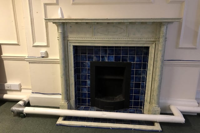 One of the two fireplaces that required repair work.