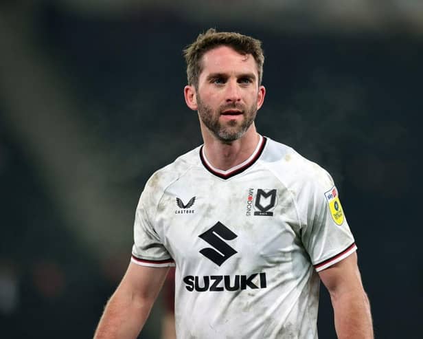 Will Grigg has signed from Chesterfield from Milton Keynes Dons.