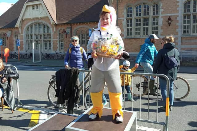 Cooper Wallace with his prize on the winners' podium at the gull screeching competition in Belgium.