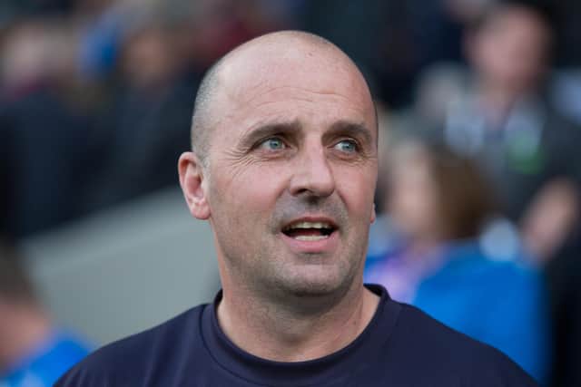 Paul Cook has returned to Chesterfield as manager.