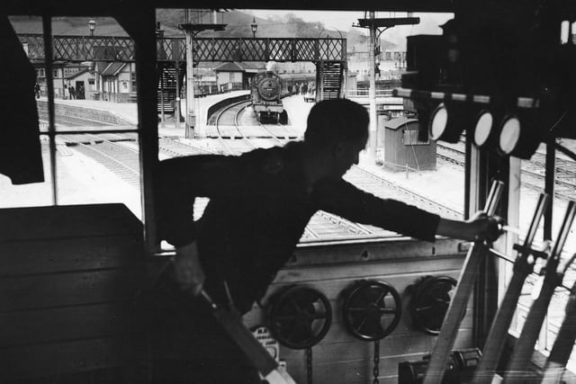 The signalman at Ambergate, where a triangular junction joining London, Manchester and Chesterfield kept him busy in May 1936.   (Photo by E. Dean/Topical Press Agency/Getty Images)