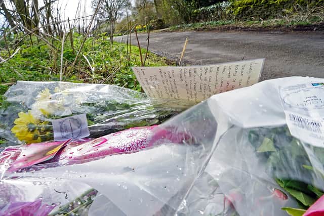 Floral tributes at Harewood Road, Holymoorside.