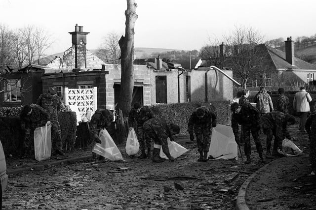 Some of the Gordon Highlanders brought in to help search for more of the wrecked Pan Am jumbo jet, scouring Sherwood Crescent, the road most devastated by the Boeing 747 which crashed on Lockerbie.  Eleven local people are believed to have died in their homes.