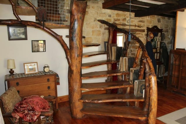 This eye-catching and unusual staircase is built from English elm wood.