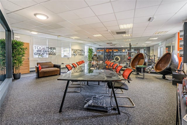 Be chairman of the board in this impressive glass-walled office which is on the ground floor.