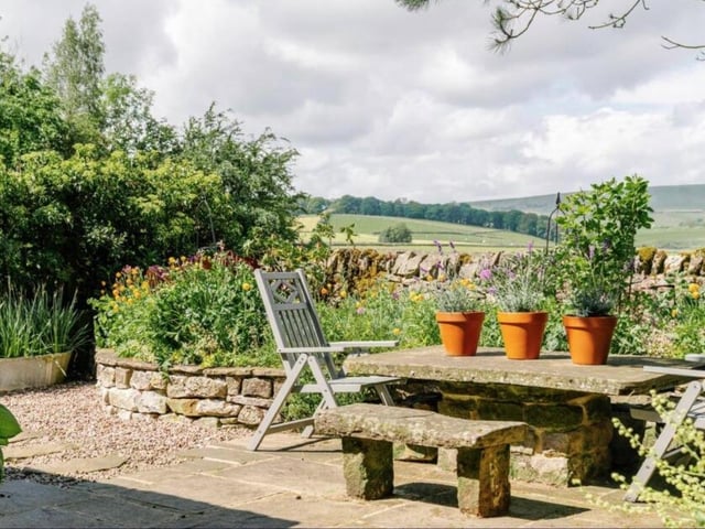 Plenty of places to sit outdoors and enjoy looking at the picturesque landscape.