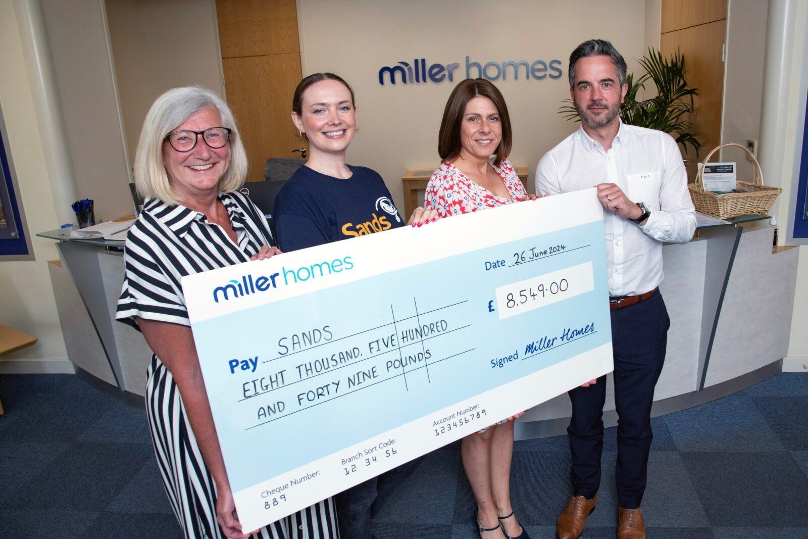 Housing staff raise thousands for baby loss charity