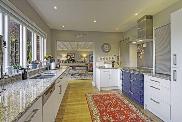 The large kitchen is situated at the rear of the property on the ground floor, and offers great views across the expansive garden.