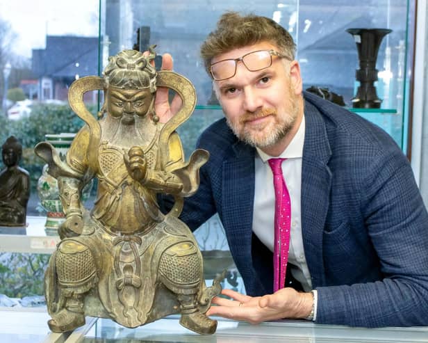 Charles Hanson, owner of Hansons, with the Wudi figure that achieved a hammer price of £68,000