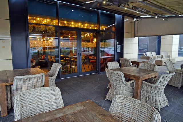 The covered outdoor terrace is perfect for warmer weather.