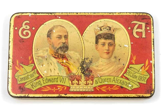 The special tins of Cadbury’s vanilla chocolates were made to celebrate the coronation of King Edward VII and Queen Alexandra on June 26,  1902. Both monarchs feature on the front of the tin alongside the coronation date.  Photo:  Mark Laban / Hansons / SWNS