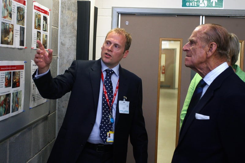 At the opening of  Forth Valley Royal Hospital, The Duke is shown around by Mike Mackay, contract director of SERCO.