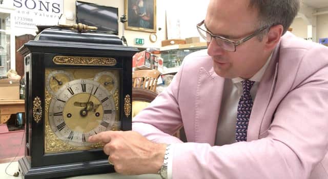 Charles Hanson with the Tompion clock which earned its Belper owner £200,000 at auction.