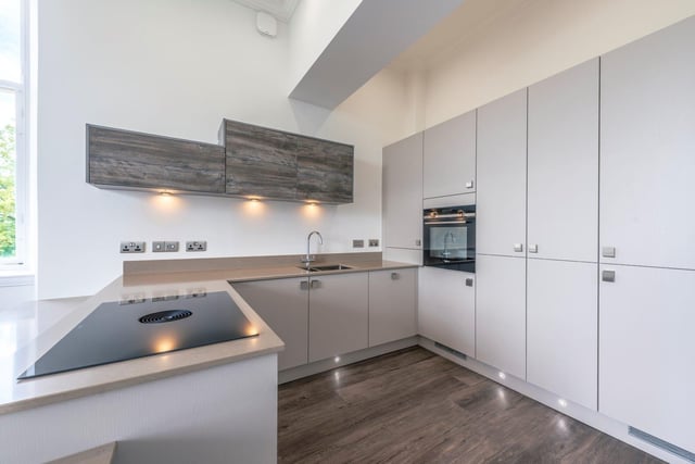 The modern Brooklyn kitchens have appliances by Siemens.