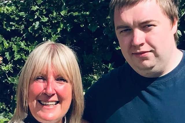 Lynda Cam and her son Lewis who was turned away from an all you can eat Chinese buffet because he was dining alone.