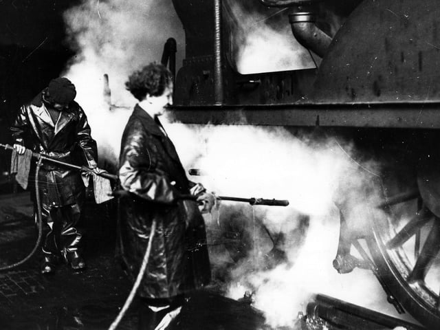 Women cleaning trains at Southsea, November 1942. The News PP522