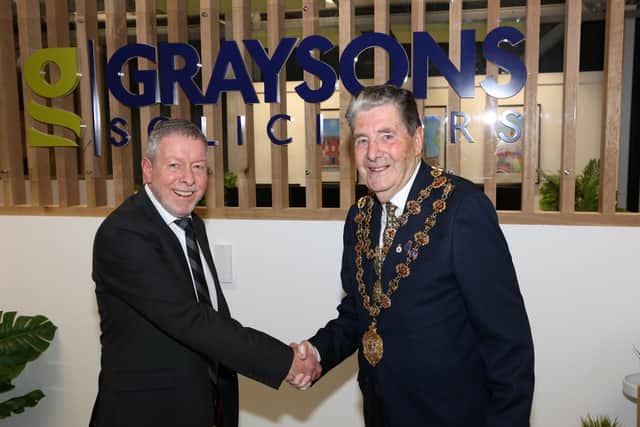 Managing partner Peter Clark (left) with former Lord Mayor, Councillor Tony Rogers, launching the new Graysons office at the Glass Yard.