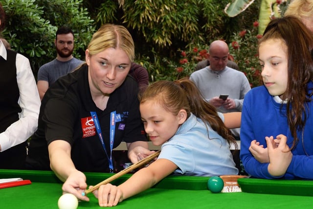Snooker Womens Day at Sheffield Winter Garden. Pictured is Ladies World ranked No 3 Rebecca Kenna giving instuction to Natilley Caudwell from Spire Junior School.