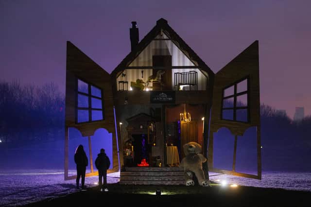 A giant pop-up ‘haunted’ doll’s house is unveiled today by Alton Towers Resort to mark the official launch date of the theme park’s newest dark ride, ‘The Curse at Alton Manor’, which opens March 18 (photo: David Parry/PA Wire)