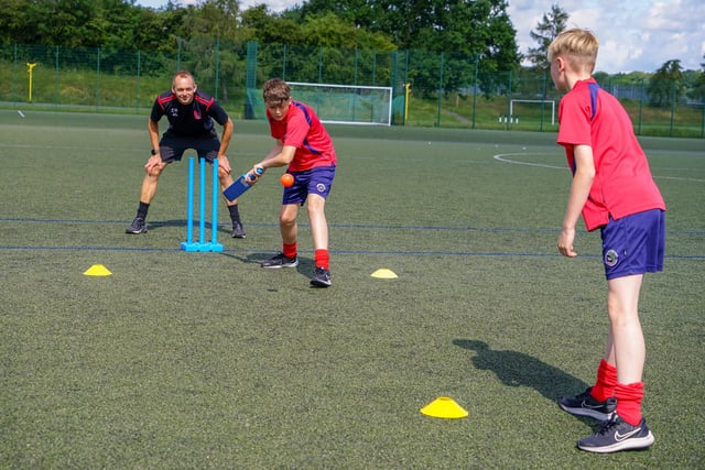 Brookfield School offers lots of sports and music clubs, including Young Enterprise, Chess Club, Debating Society, Warhammer Club, Journalism (S40), Sports Leaders. Above year seven during a quick cricket session at PE classes.