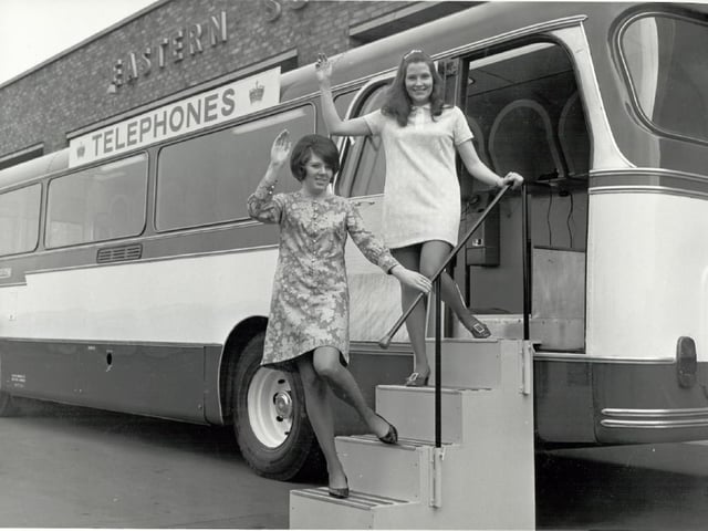 Telephone operators outside the new exchange, which was set up in a bus.