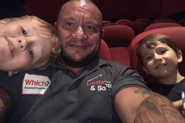 Big-hearted roofing company boss Liam Anderson, with his sons Zachary, 9, and Samuel, 5.