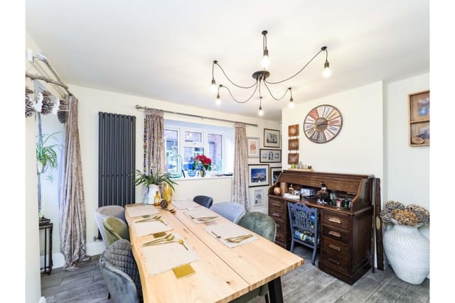 Six people can easily be accommodated at a dining table in this well proportioned room. A deep recessed window and additional stable style window flood the room with natural light.