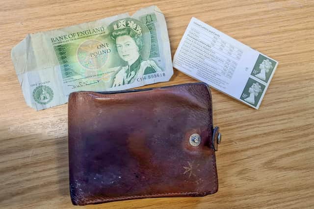 The brown wallet contained a one-pound note, stamps worth 18p and receipts from 1987.