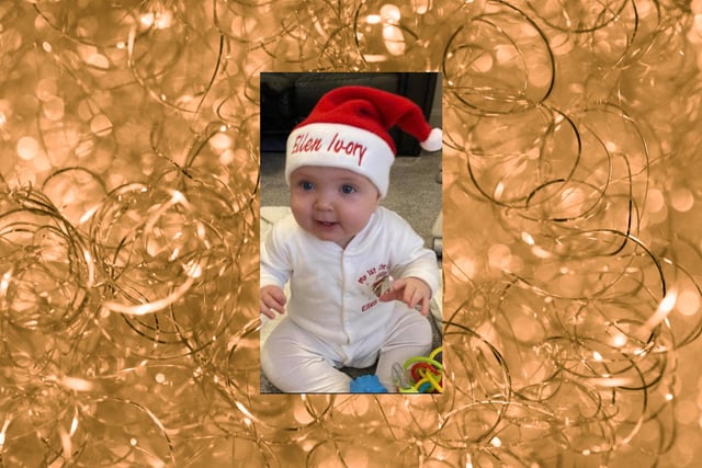 A personalised Santa hat for Ellen-Ivory's first Christmas.