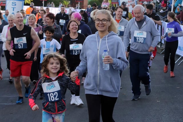 Young and old are pictured at the start of the fun run.