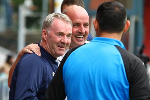 Paul Cook and John Sheridan all smiles before kick-off at Boundary Park. Picture: Tina Jenner.