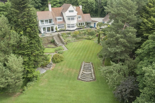The house sits within more than an acre of gardens, and an extra two-and-a-half acres of land is included in the sale.