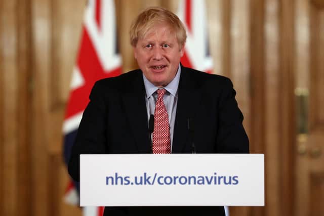 LONDON, ENGLAND - MARCH 12: British Prime Minister Boris Johnson holds a news conference addressing the government's response to the coronavirus outbreak on March 12, 2020 in London, England. (Photo by Simon Dawson-WPA Pool/Getty Images)