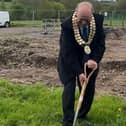 Councillor David Taylor, Mayor of Amber Valley, 'breaking the ground' at Charles Hill