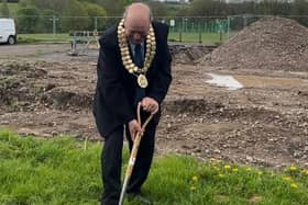 Councillor David Taylor, Mayor of Amber Valley, 'breaking the ground' at Charles Hill